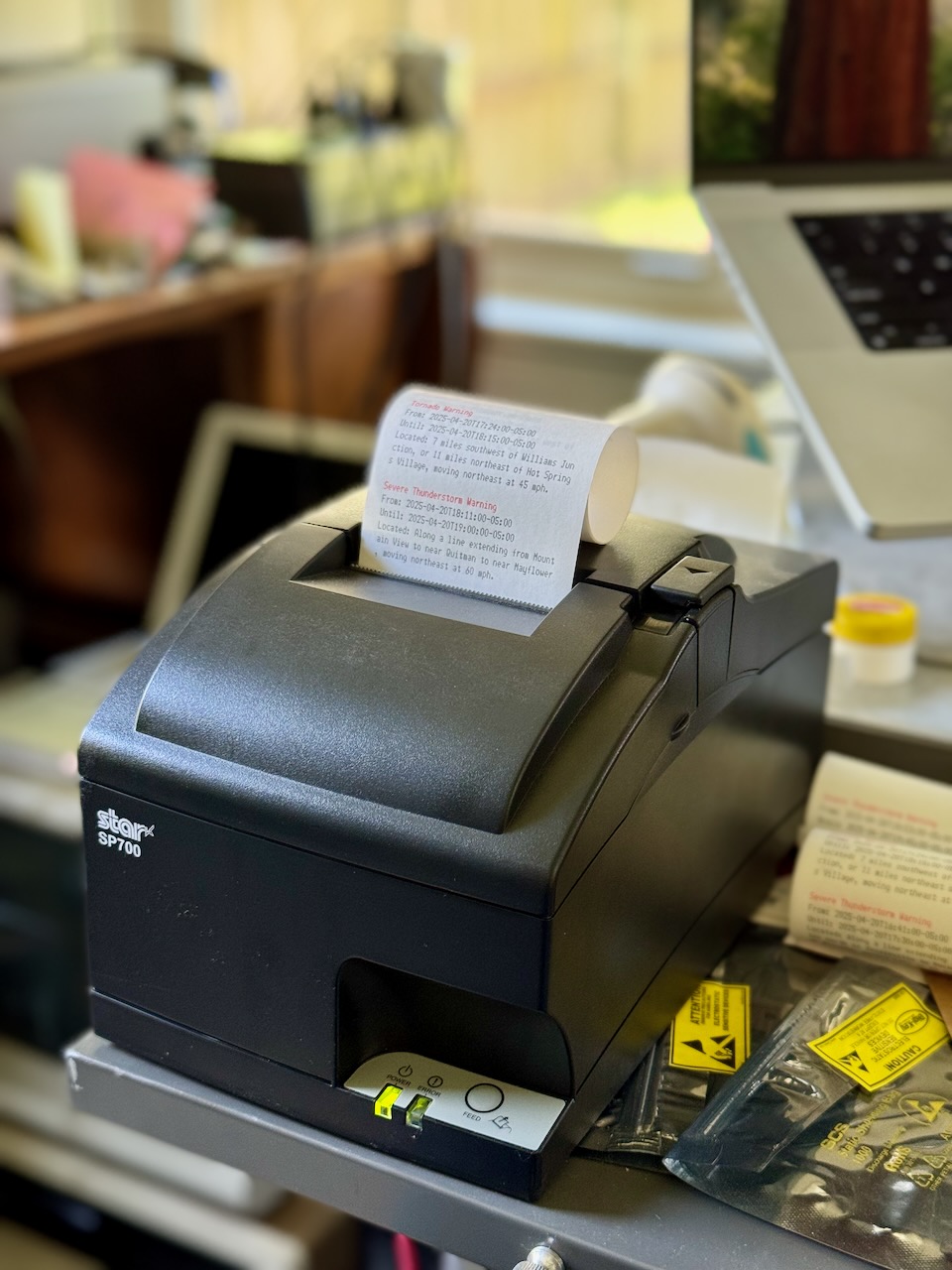 Star SP-700 receipt printer with printed weather alerts